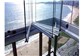 Manutenção de cortina de vidro no Porto das Dunas